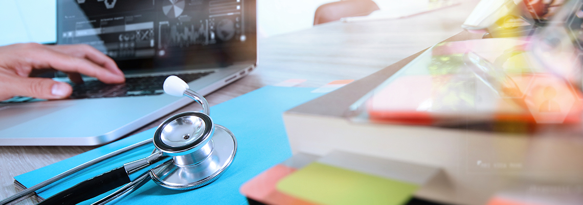 Laptop and stethoscope